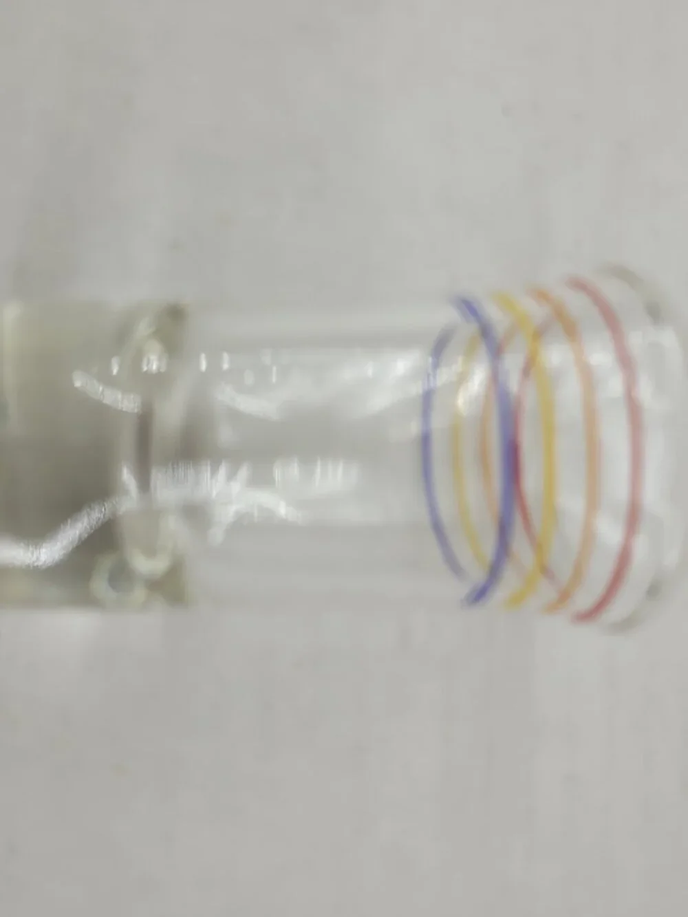 Vintage shot glass clear with orange red yellow blue stripes Mid-century Modern